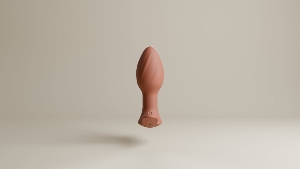 Euphora - Vibrating and Rotating Buttplug - Wet Master